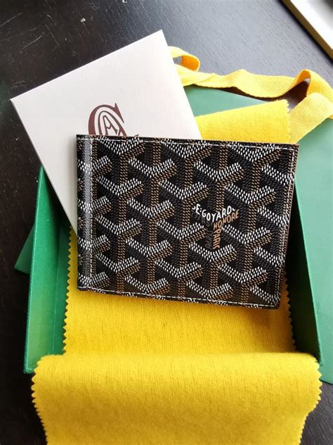 goyard money clip wallet.